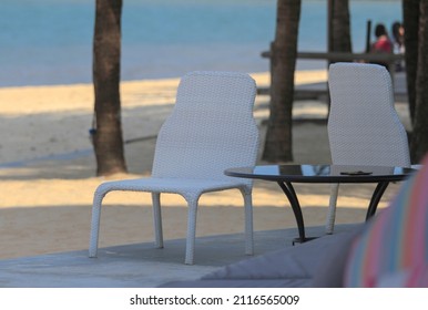 Empty Table and chair on the beach and sea background Ranong Province, Thailand