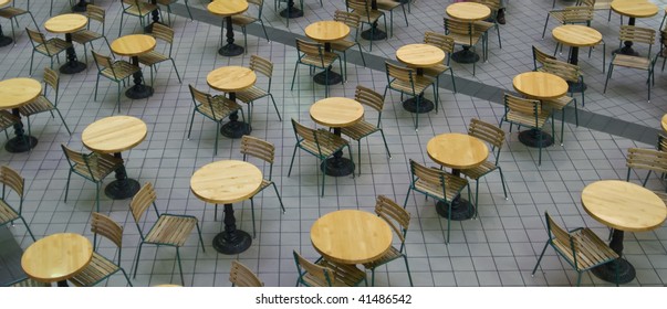 Empty Table And Chairs In A Food Court Waiting For Hungry Customers.