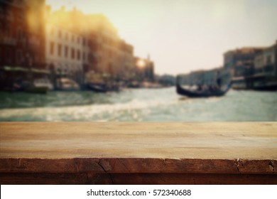 Empty Table In Front Of Blurry Romantic Venice Background. For Product Display Montage