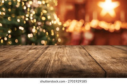 Empty table in front of christmas tree with decorations background. For product display montage