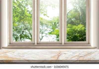 Empty table marble over blur background, for your photo montage or product display, Space for placing items on the table, product and food display. - Shutterstock ID 1636045471