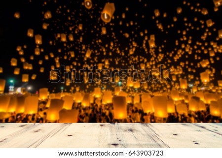 Empty table on blur sky lantern background at Chiang Mai , Thailand