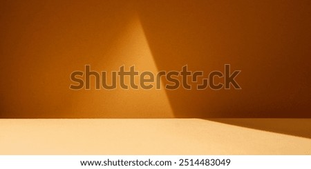 Empty table on dark beige background with natural light and geometric shadow on the wall. Mock up for branding products, presentation, food and health care.	
