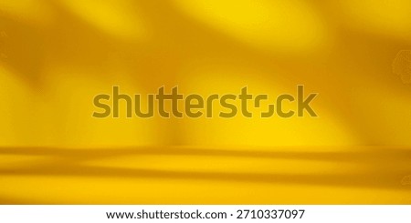 Empty table on smooth yellow wall background. Composition with abstract light reflections and shadows. Mock up with blurry spotlight for presentation, branding products, cosmetics and food.