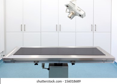 Empty Table In An Operating Room With Light Above.