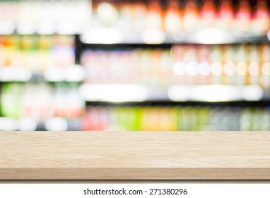 Empty table over blur supermarket with bokeh background, Product shelf