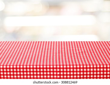 Empty Table With Red Check Tablecloth Over Blur Festive Bokeh Background, Product Display