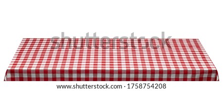 Empty table with red and white checkered or chequered tablecloth from top view isolated on white background. Including clipping path.