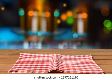 Empty Table Top And Tablecloth With Liquor Bar Background