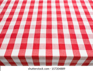 Empty Table Top View Covered By Red Gingham Tablecloth