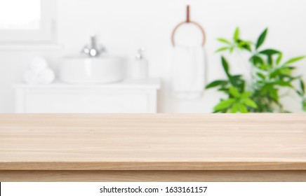 Empty Tabletop For Product Display With Blurred Bathroom Interior Background