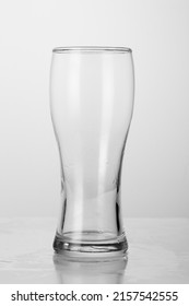 Empty Tall Beer Glass Isolated On White Background, Close-up