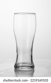 Empty Tall Beer Glass Isolated On White Background, Close-up