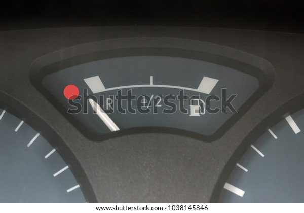 Empty tank indicator on car dashboard.
Concept - economic crisis, deficit, lack of money, lack of strength
and health, fatigue, fuel consumption.
