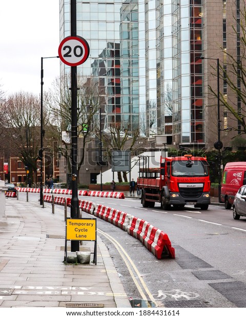Empty temporary cycle lane in Hammersmith London UK\
December 2020