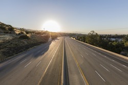 Empty Ten Lane Route 118 Freeway At Sunrise In The San Fernando Valley Area Of Los Angeles, California.