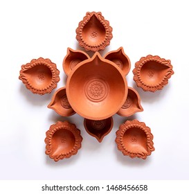 Empty Terracotta Oil Lamp On White Background.