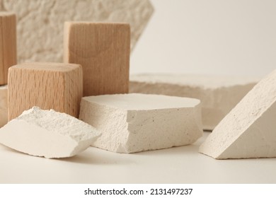 Empty texture stone and wood platform eco podium on beige copy space background. Minimal still life display product presentation scene. - Shutterstock ID 2131497237