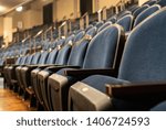 Empty theater seats in a restored historical theater