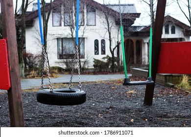 Empty Tire Swing On A Playground