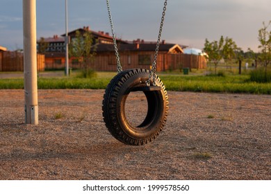 Empty Tire Swing At Playground. 