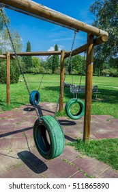 Empty Tire Swing Set At Playground