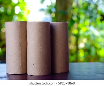 Empty Tissue Paper Roll On Nature Background