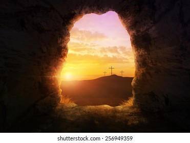 Empty tomb with three crosses on a hill side. - Shutterstock ID 256949359