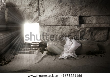 Empty tomb while light shines from the outside. Jesus Christ Resurrection. Christian Easter concept.
