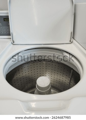 Empty Top Load Washing Machine with Open Door
