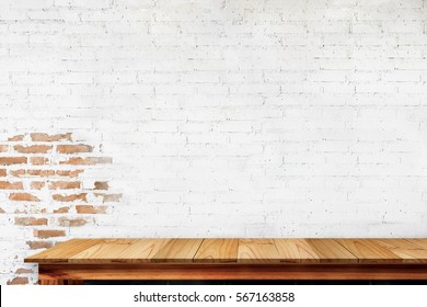 Empty Top Of Natural Wooden Table And Retro White Brick Wall Background. For Product Display