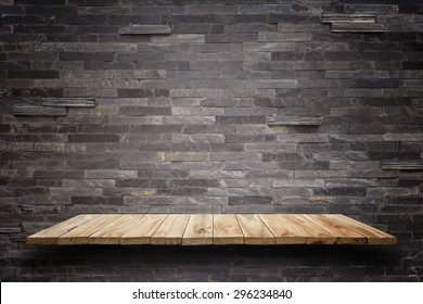 Empty Top Wooden Shelves And Stone Wall Background. For Product Display 