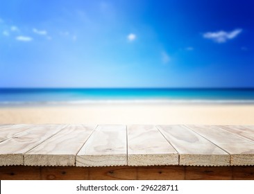 Empty Top Of Wooden Table Or Counter And View Of Tropical Beach. For Product Display
