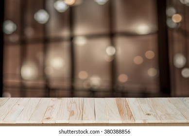 Empty Top Of Wooden Table Or Counter On Cafeteria, Bar, Coffeeshop Background. For Product Display