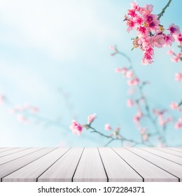 Empty Top Wooden Table And Pink Cherry Blossom Flowers Background.