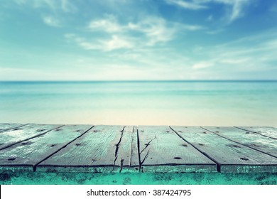 Empty Top Of Wooden Table And View Of Tropical Beach Background. For Product Display  