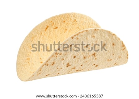 Empty tortilla, thin wheat flatbread isolated on white background