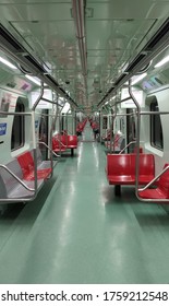 empty train car with light reflections on the floor