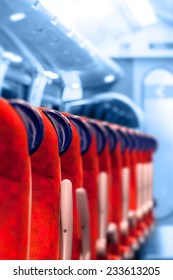Empty Train Seats in a row - Light blue background