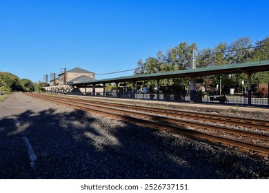 Empty train station early in the morning just after sunrise. - Powered by Shutterstock