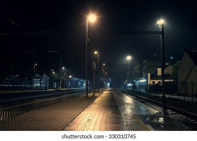 Empty train station at night - Powered by Shutterstock