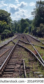 Empty Train Tracks With Dramatic Clouds