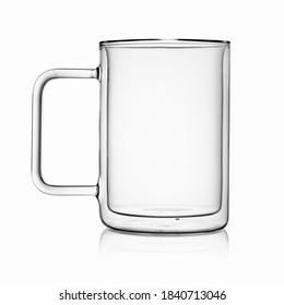 Empty transparent double wall glass tea or coffee mug isolated on white background.