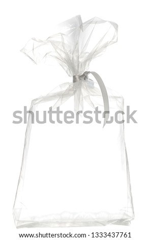 Empty transparent packaging bag filled with water and air on a white background