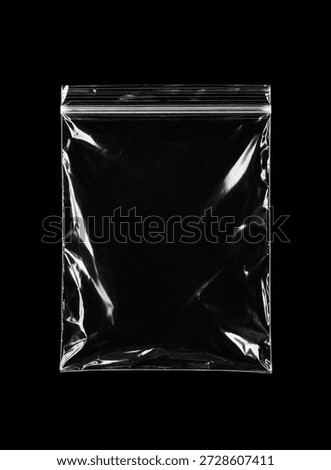 Empty Transparent Zip Lock Plastic Bag on Black Background