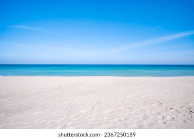 Empty tropical beach and seascape, Beautiful sandy beach and sea in sunny day,Blue sky in good weather day, Beach sea space area nature background