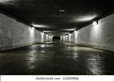 Empty tunnel at night