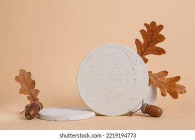 Empty two product podium. natural stone, autumn leaves against beige background. Fall Seasonal Background - Shutterstock ID 2219194773