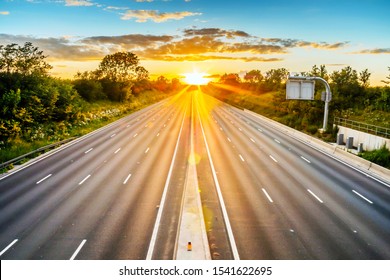 empty UK motorway in England at sunset with no traffic