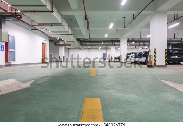 Empty underground parking\
lot area